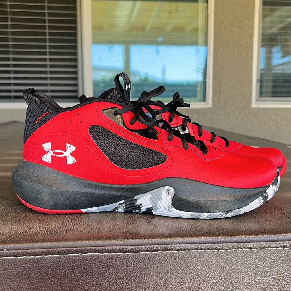 Under Armour size M12 red and black leather high top sneakers.